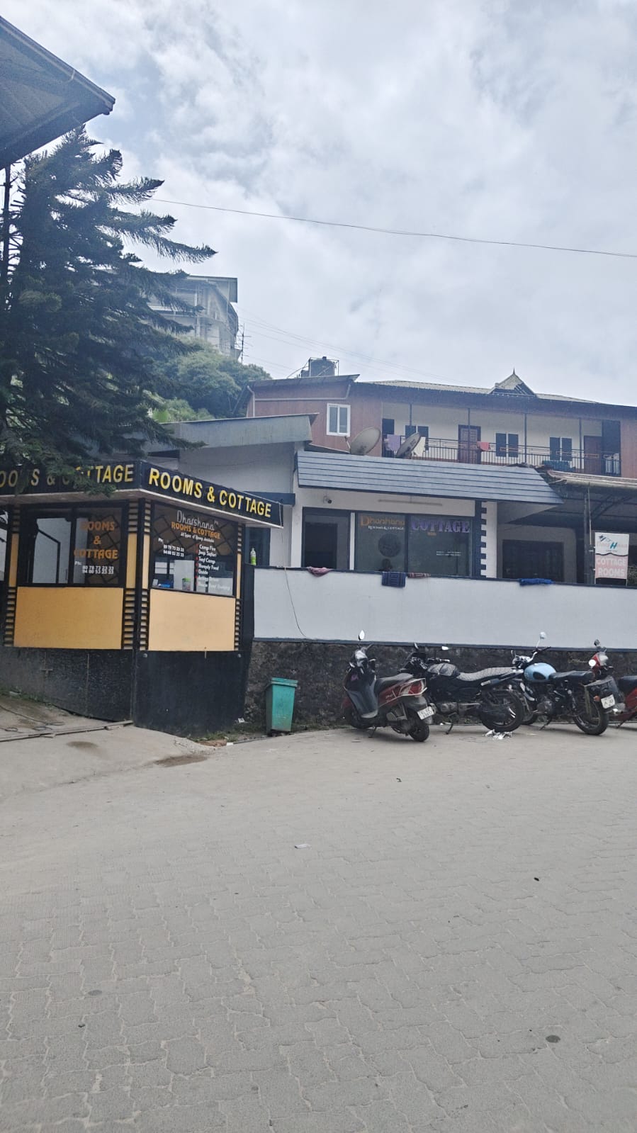 Outside board at Dharshana Rooms and Cottage