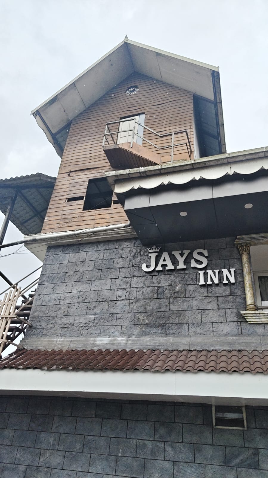 Jays Inn sign on the stone front of the building