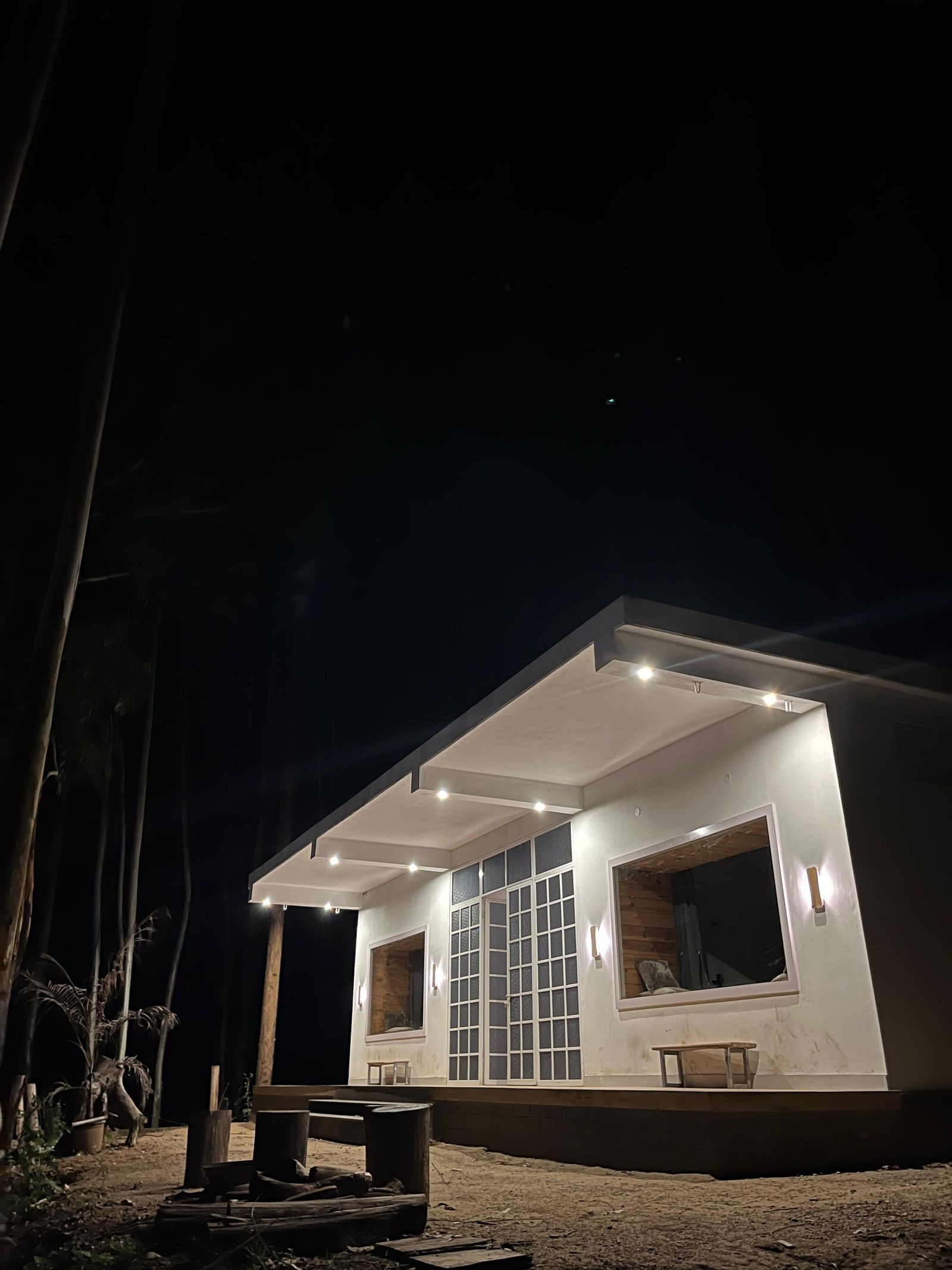 Chalet Villa lit up at night